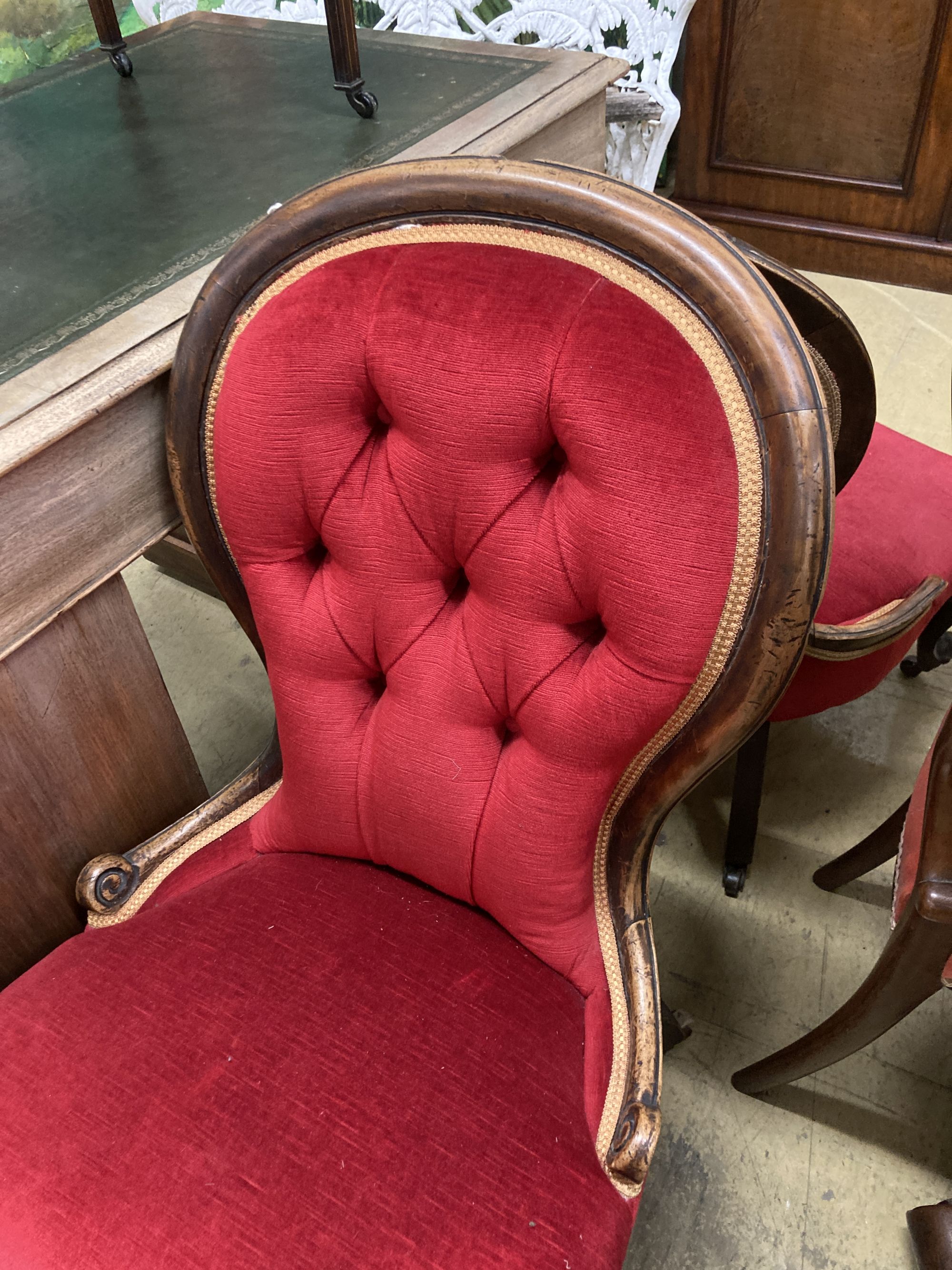 Two Victorian mahogany spoon back nursing chairs